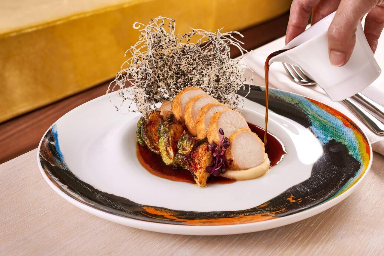 Ette Luxury Hotel & Spa Four Corners Buitenkant foto A plate of abalone